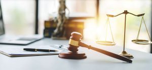 A gavel sitting on a desk